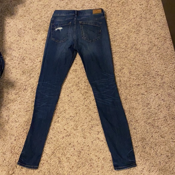 LIKE NEW Express women’s stretch ripped jean leggings mid rise in size 2R - Picture 5 of 9